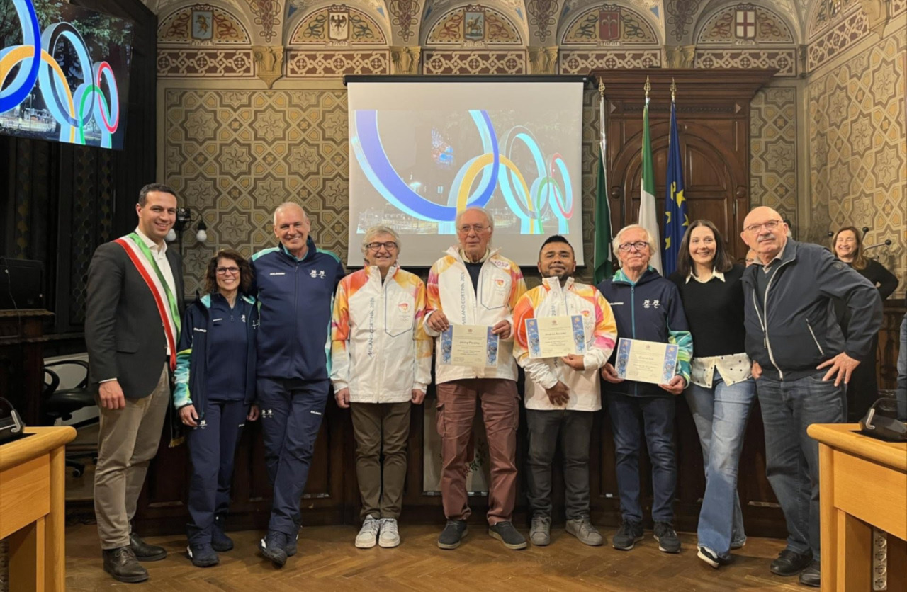 Rho celebra l’impegno di volontari, tedofori e forze dell’ordine durante i Giochi